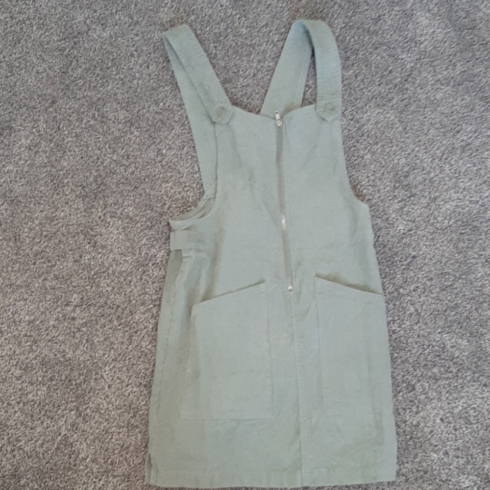 Overall dress with half zip in front and pockets